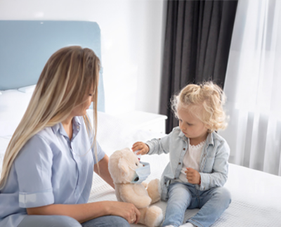 Child and therapist working together